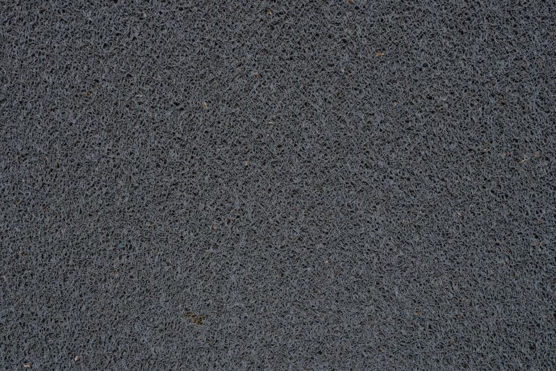 Home 9 Detailed view of a gray synthetic doormat showcasing its fib 1786467764