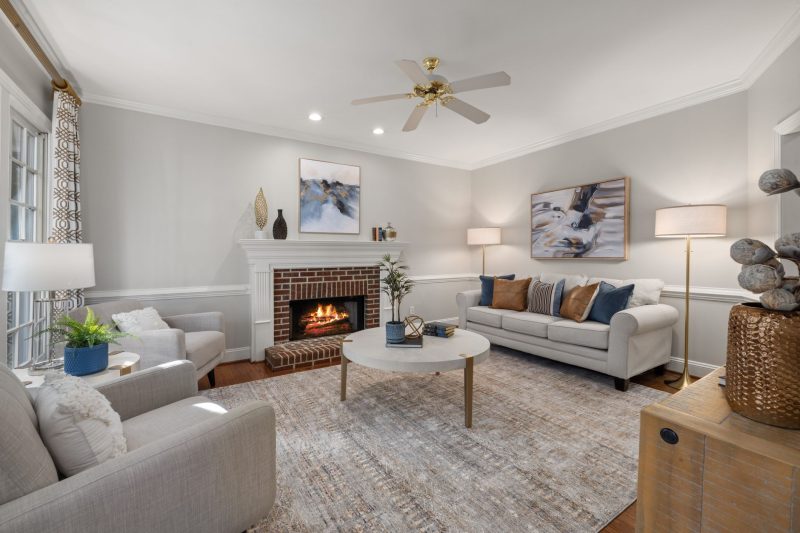 Home 9 A cozy modern living room featuring a fireplace elegant sofa 1788282050